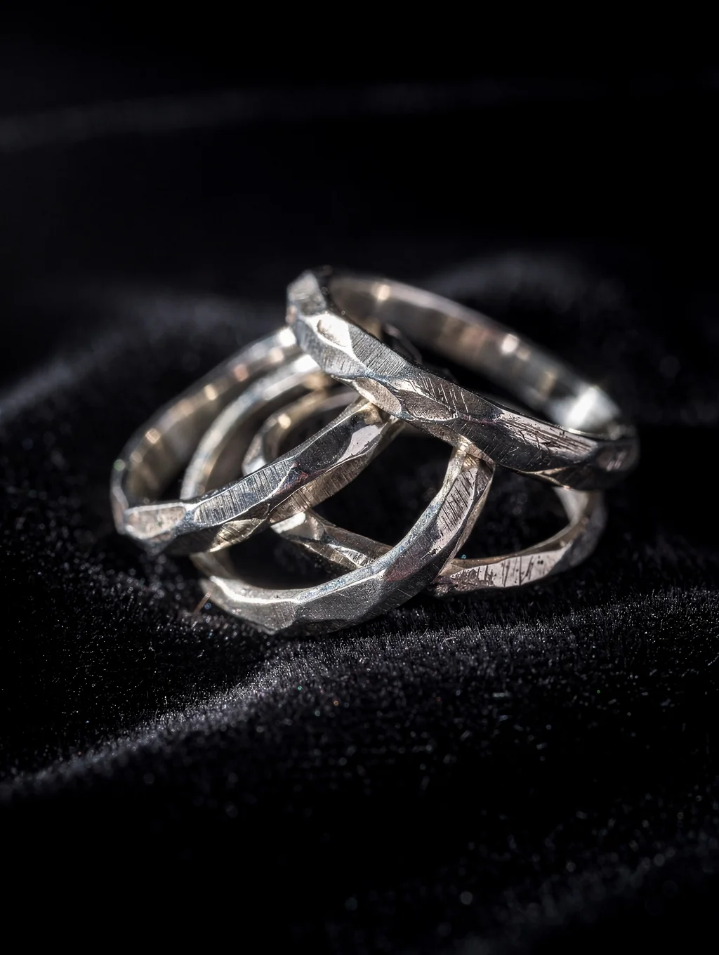 Bold sculptural sterling silver statement ring on display